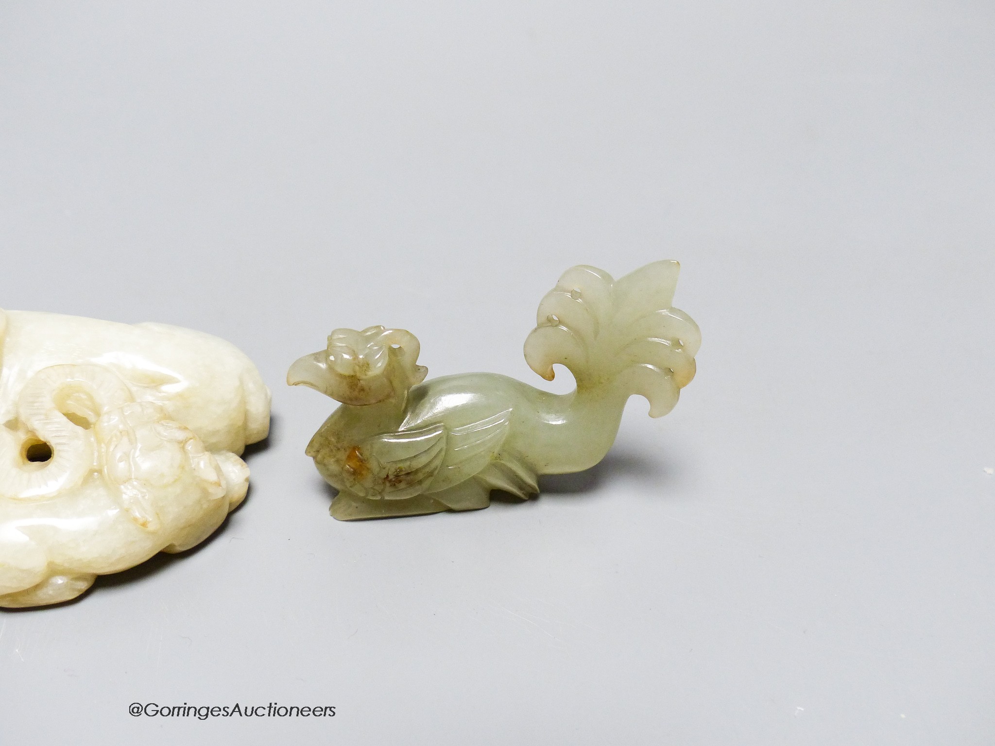 Three Chinese jade carvings of a wild cat and cub, a pig and a phoenix, 5.4 - 6.2cm